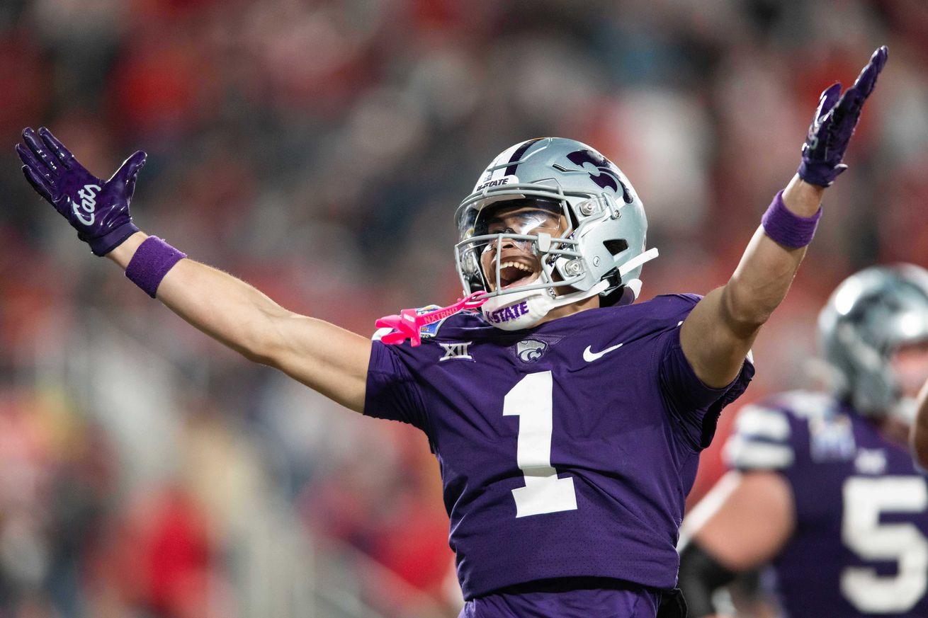 Dec 28, 2023; Orlando, FL, USA; Kansas State wide receiver Jayce Brown (1) celebrates a touchdown against NC State in the fourth quarter at Camping World Stadium.