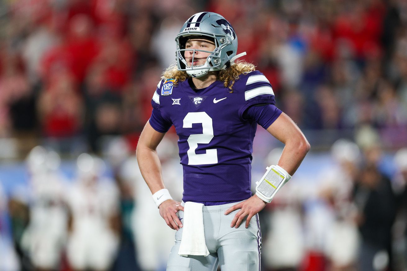 Kansas State Wildcats quarterback Avery Johnson (2) waits for a play call against the North Carolina State Wolfpack in the first quarter during the Pop-Tarts bowl at Camping World Stadium.