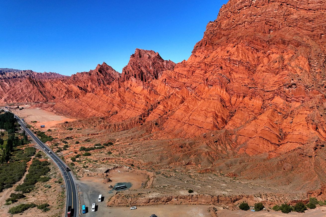 Tourists Explore Tianshan Grand Canyon In Aksu