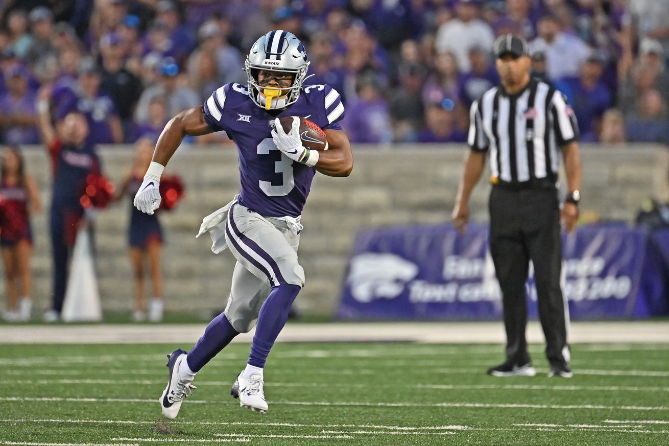 Running back Dylan Edwards #3 of the Kansas State Wildcats returns a punt 71-yards for a touchdown against the Arizona Wildcats in the first half at Bill Snyder Family Football Stadium on September 13, 2024 in Manhattan, Kansas.