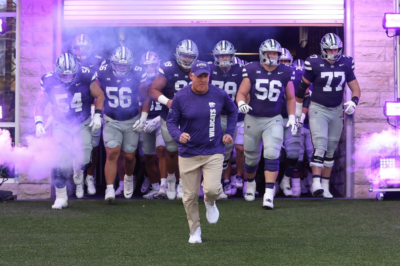 Kansas State Wildcats head coach Chris Klieman leads his team onto the field before a college football game between the Arizona Wildcats and Kansas State Wildcats on September 13, 2024 at Bill Snyder Family Stadium in Manhattan, KS.