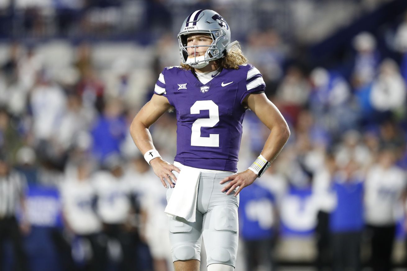 Kansas State quarterback Avery Johnson stands on the field during a game at Brigham Young University September 2024