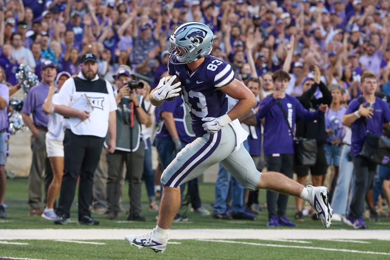 Sep 13, 2024; Manhattan, Kansas, USA; Kansas State Wildcats tight end Will Swanson (83) scores a touchdown in the third quarter against the Arizona Wildcats at Bill Snyder Family Football Stadium.