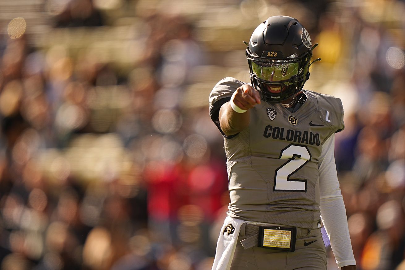 College Football: Colorado quarterback Sheduer Sanders (2) in action, points vs Arizona at Folsom Field. Boulder, CO 11/11/2023 