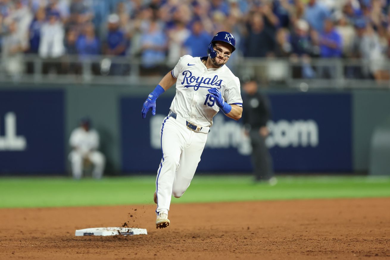 Kansas City Royals second base Michael Massey (19) rounds second base on his way to an RBI triple in the fifth inning of game 3 of the ALDS between the New York Yankees and Kansas City Royals.