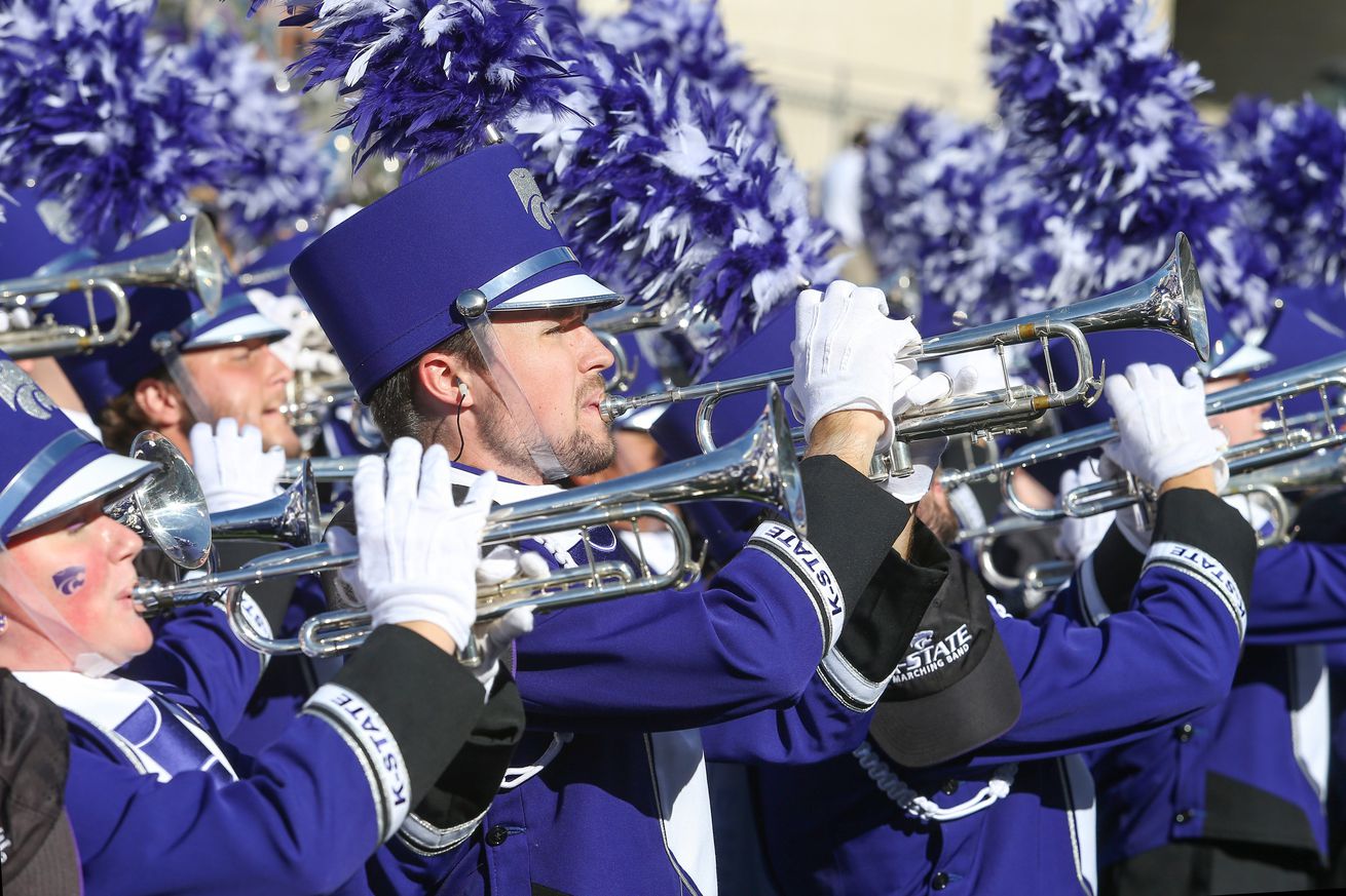 Sep 28, 2024; Manhattan, Kansas, USA; Trumpet players in the Kansas State Wildcats Pride of Wildcat Land Marching Band perform before a game between the Kansas State Wildcats and the Oklahoma State Cowboys at Bill Snyder Family Football Stadium.