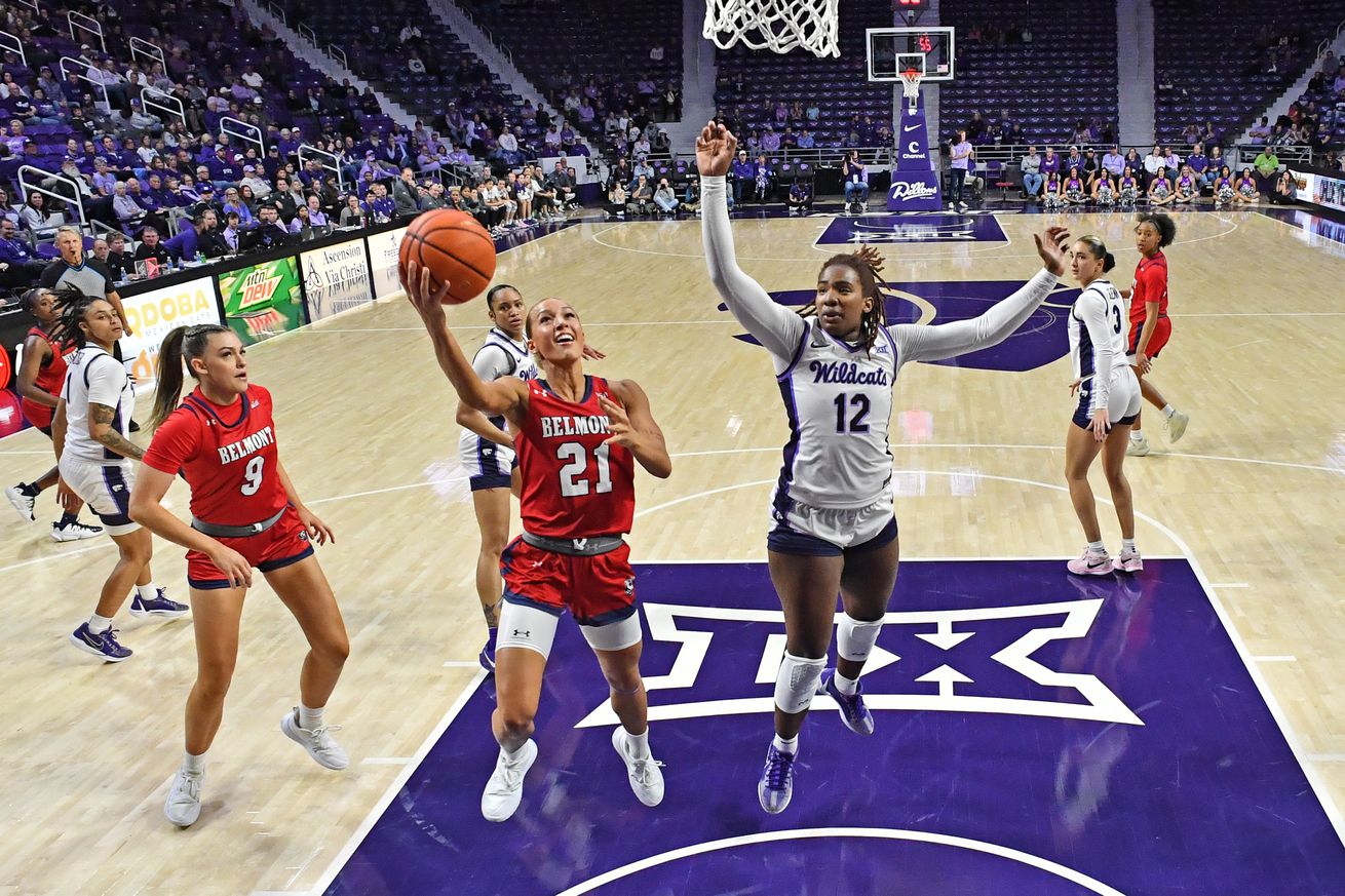  Emily La Chapell #21 of the Belmont Bruins goes to the basket against Kennedy Taylor #12 of the Kansas State Wildcats in the second half at Bramlage Coliseum on November 7, 2024 in Manhattan, Kansas.