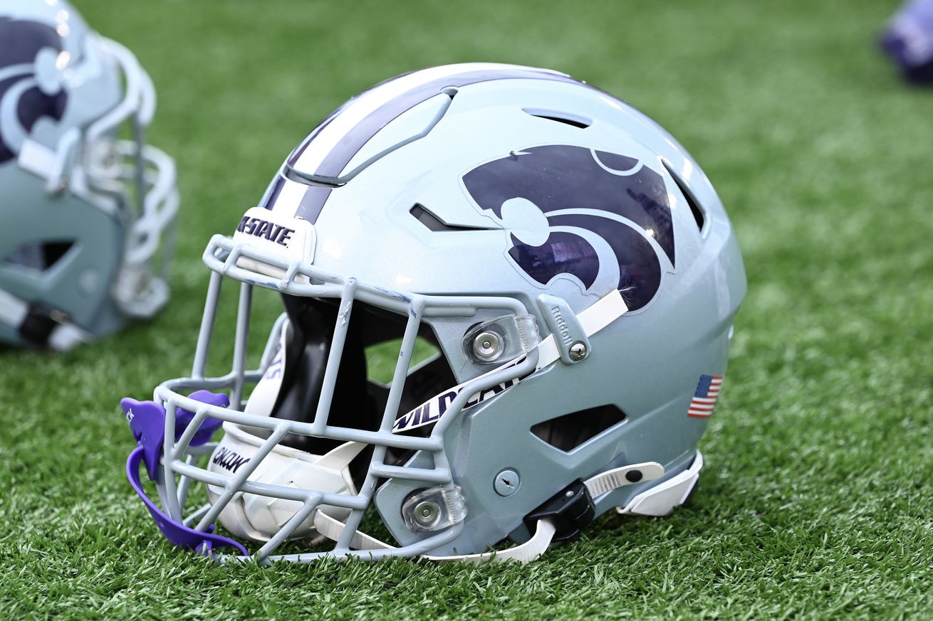 HOUSTON, TEXAS - NOVEMBER 02: A detailed view of a Kansas State Wildcats helmet on the field prior to the game agains the Houston Cougars at TDECU Stadium on November 02, 2024 in Houston, Texas.