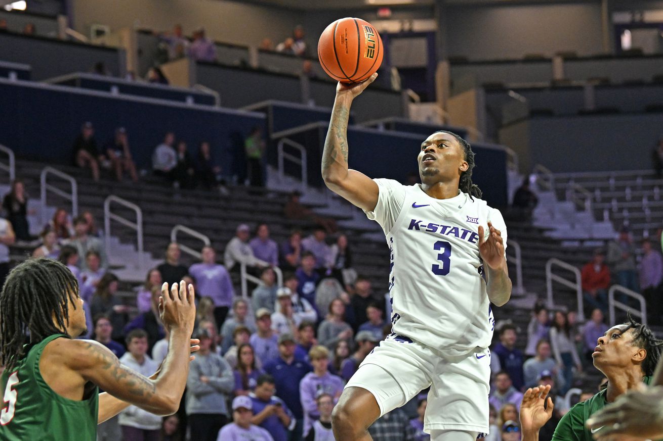 C.J. Jones #3 of the Kansas State Wildcats puts up a shot against Walter Hamilton #5 of the Mississippi Valley State Delta Devils in the second half at Bramlage Coliseum on November 19, 2024 in Manhattan, Kansas.