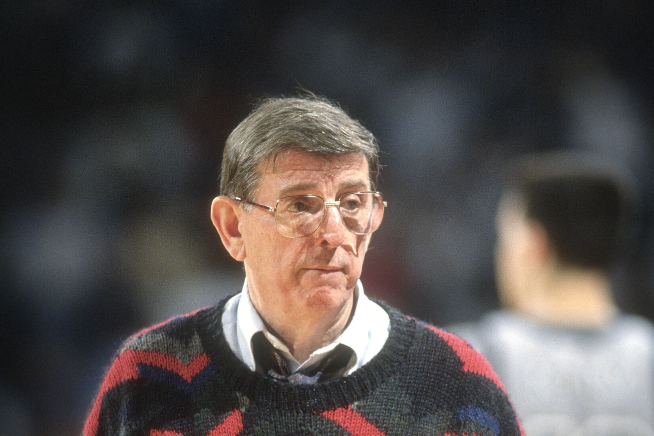 LANDOVER, MD - CIRCA 1991: Head coach Lou Carnesecca of the St. John’s Red Storm looks on against the Georgetown Hoyas during an NCAA College basketball game circa 1991 at the Capital Centre in Landover, Maryland. Carnesecca coached at St. John’s from 1965-70 and 1973-92.