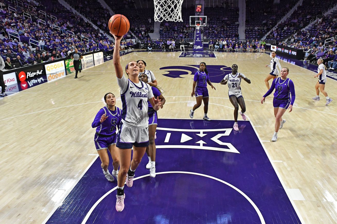 Serena Sundell #4 of the Kansas State Wildcats goes to the basket for a layup past Jade Upshaw #0 of the Central Arkansas Bears in the first half at Bramlage Coliseum on December 1, 2024 in Manhattan, Kansas.