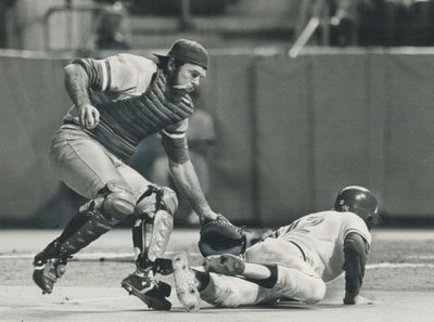 Touche: Catcher Jerry Grote of Kansas City forgot he had the ball in his other hand while attempting