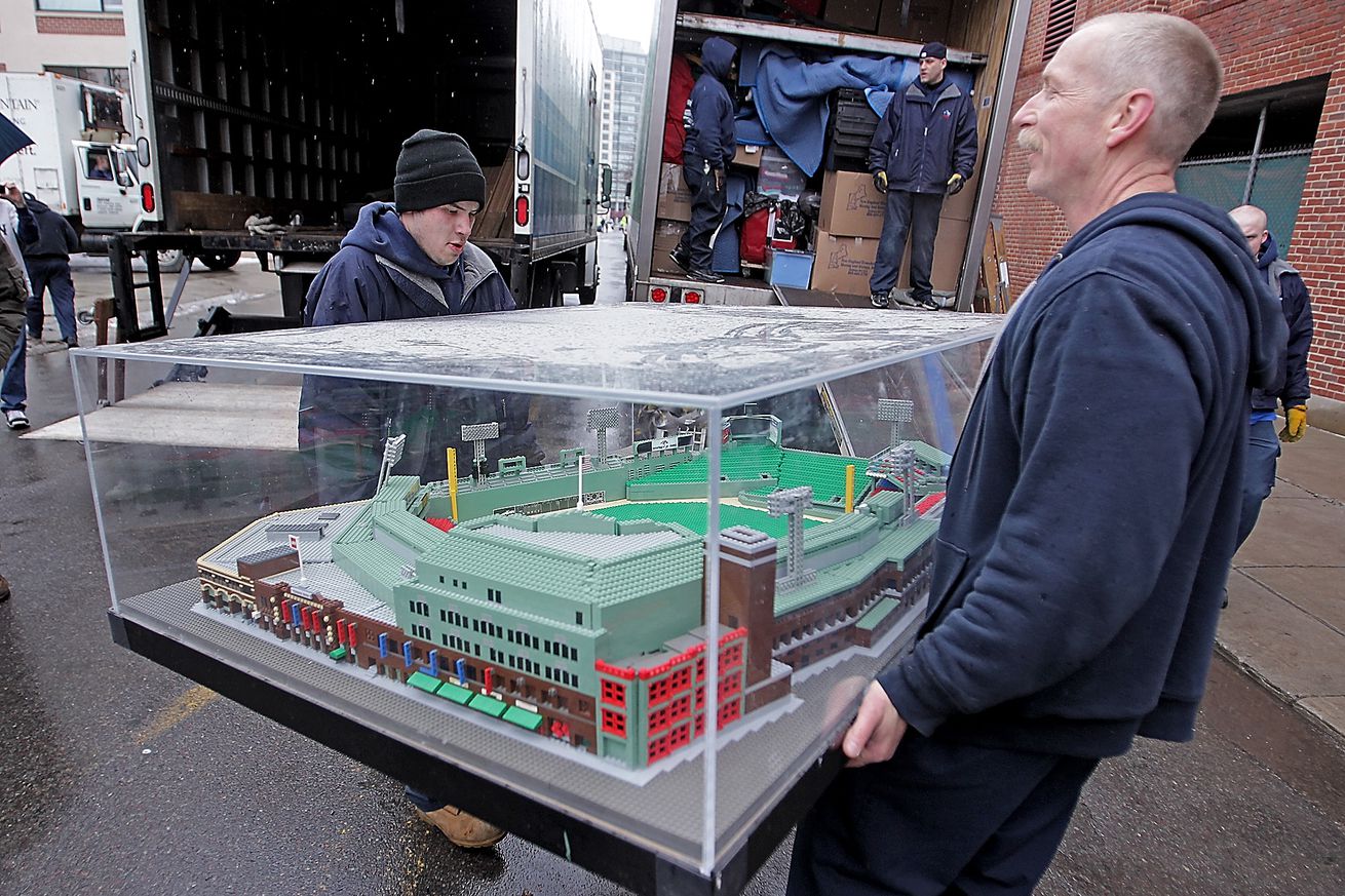 (020811 Boston, MA) President and CEO of the Boston Red Sox, Larry Lucchino walks past the Red Sox Spring Training truck before it leaves Fenway Park for Fort Myers Florida Tuesday, February 8, 2011. Staff Photo by Matt Stone