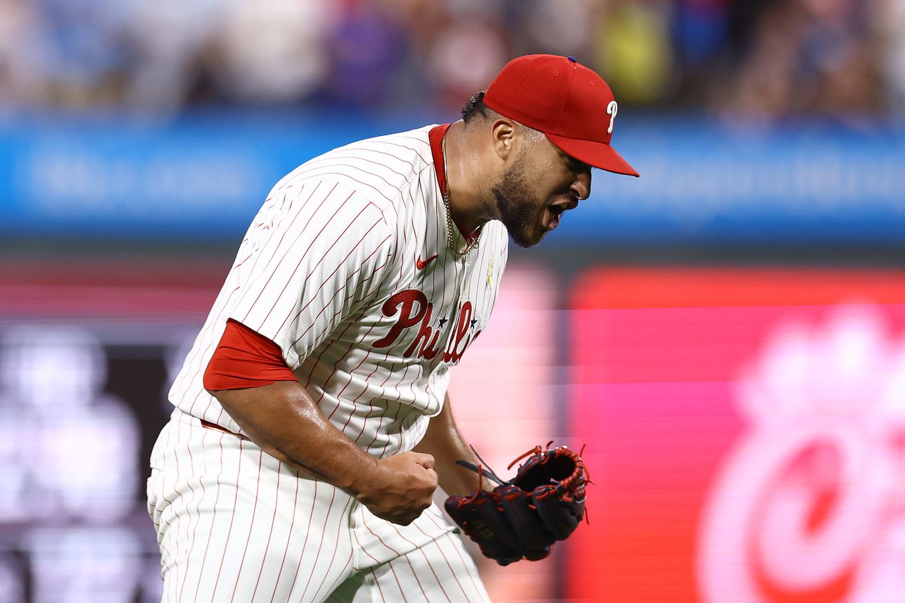 Carlos Estévez #53 of the Philadelphia Phillies reacts after pitching during the eleventh inning against the Atlanta Braves at Citizens Bank Park on September 01, 2024 in Philadelphia, Pennsylvania.