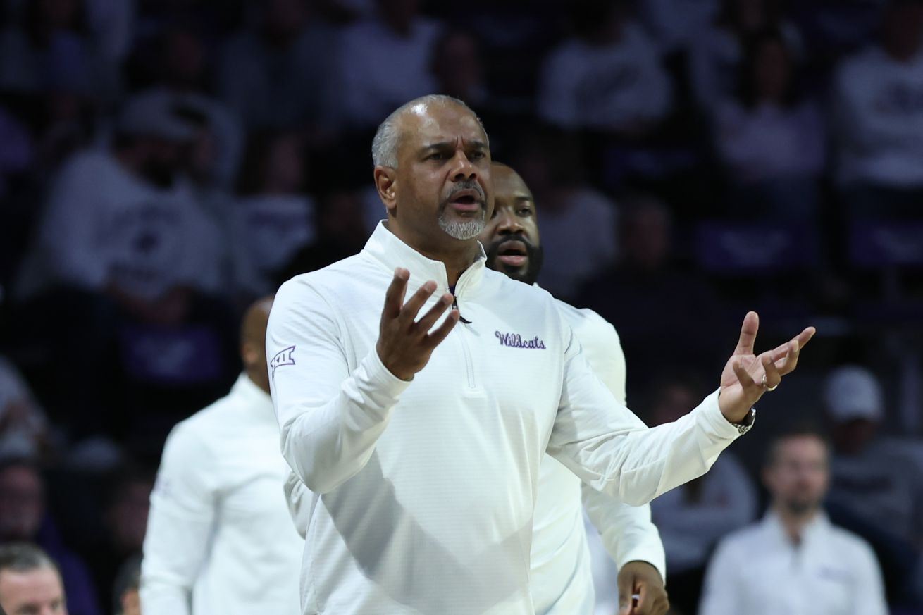 Kansas State Wildcats head coach Jerome Tang raises his hands to argue a call in the second half of a Big 12 basketball game between the Houston Cougars and Kansas State Wildcats on January 11, 2025 at Bramlage Coliseum in Manhattan, KS.