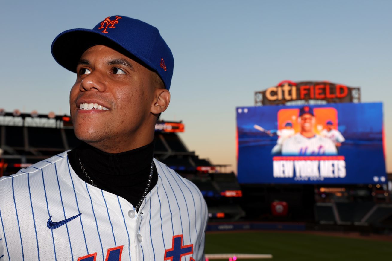 New York Mets right fielder Juan Soto poses for photos during his introductory press conference at Citi Field.