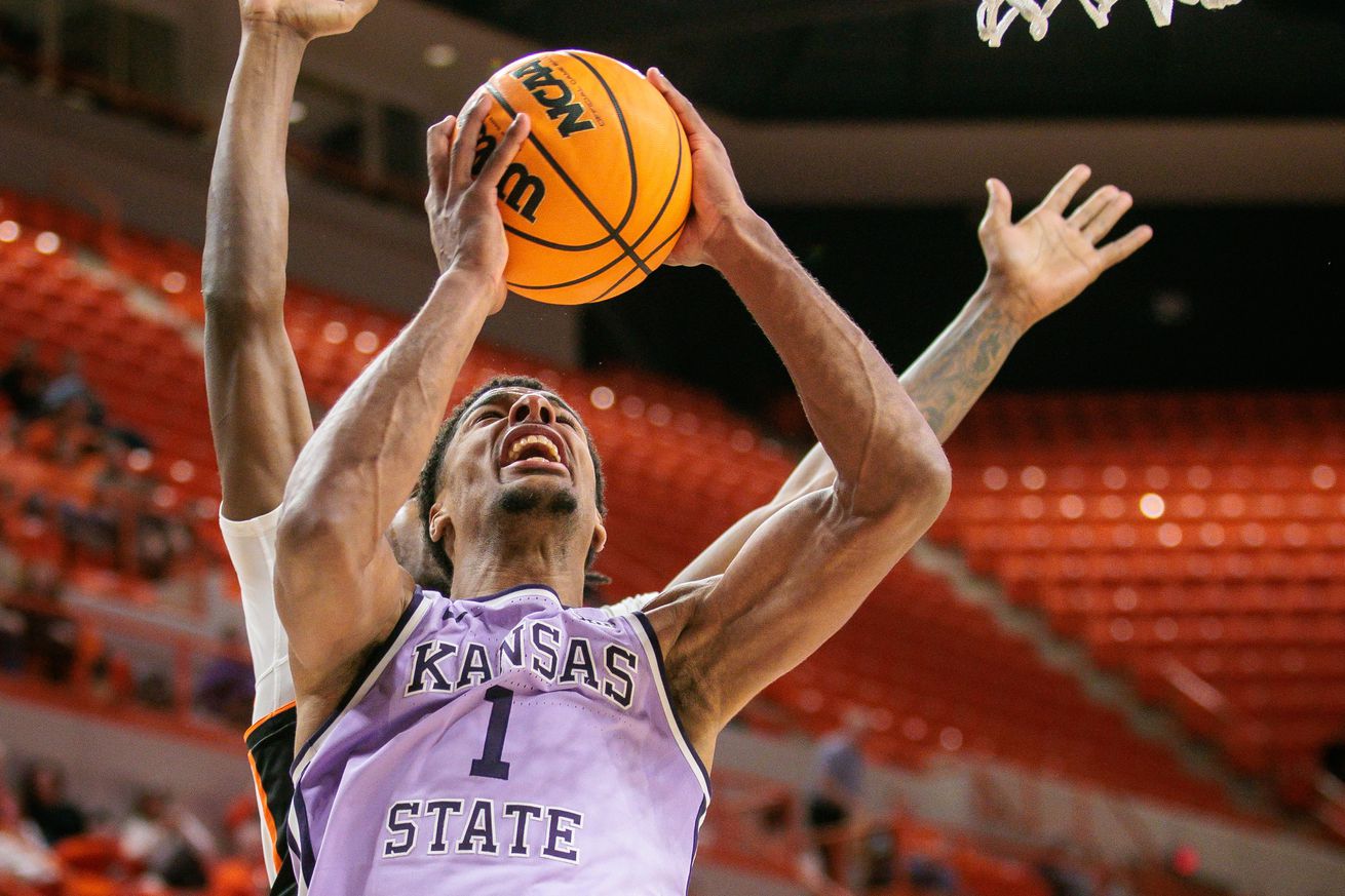 Jan 7, 2025; Stillwater, Oklahoma, USA; Kansas State Wildcats guard David N’Guessan (1) shoots the ball during the second half against the Oklahoma State Cowboys at Gallagher-Iba Arena.