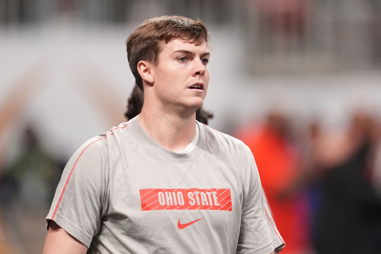 Jan 20, 2025; Atlanta, GA, USA; Ohio State Buckeyes quarterback Will Howard (18) warms up before playing against the Notre Dame Fighting Irish in the CFP National Championship college football game at Mercedes-Benz Stadium. 