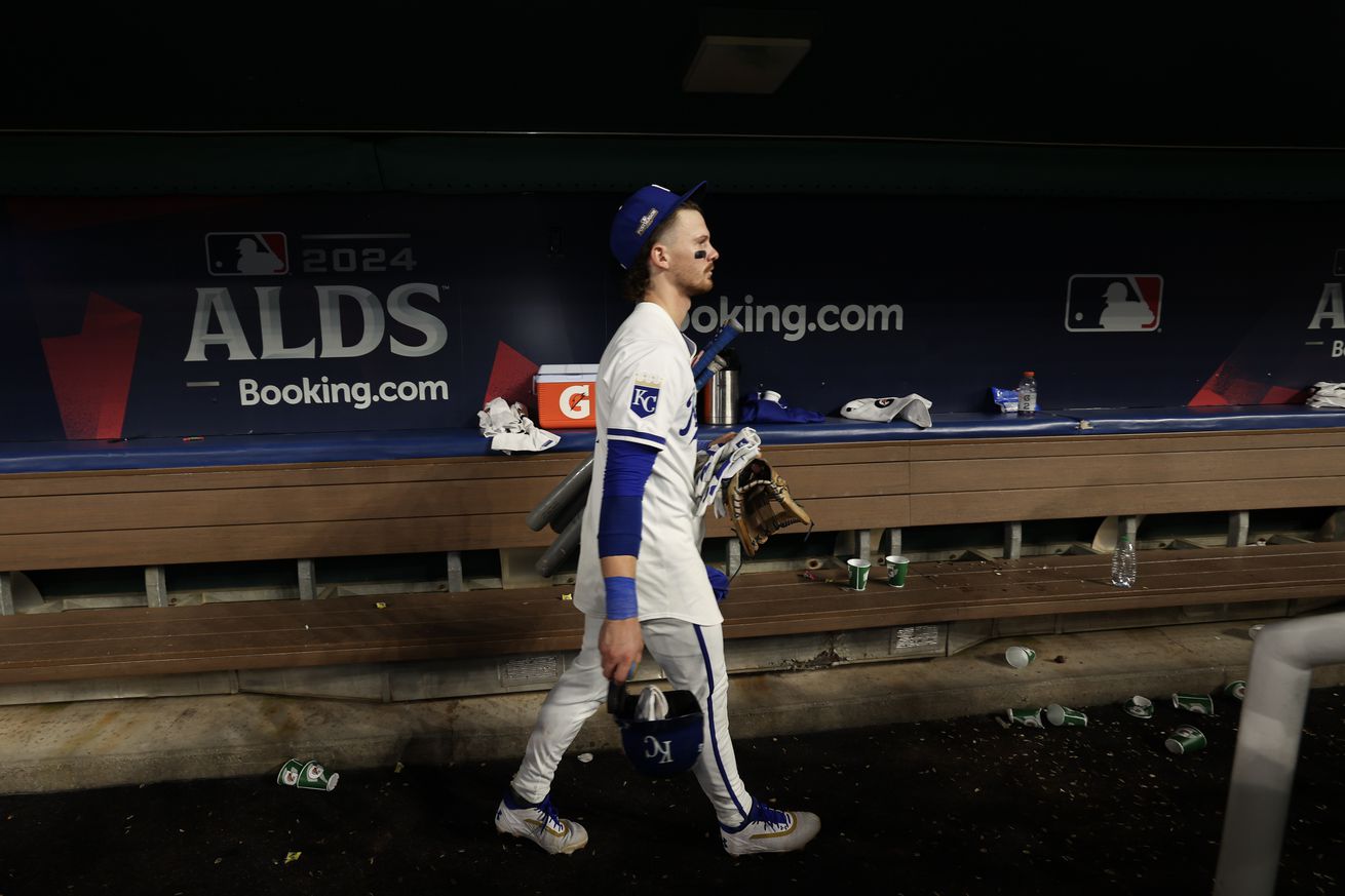 Bobby Witt Jr. #7 of the Kansas City Royals walks through the dugout after a loss to the New York Yankees during Game Four of the Division Series at Kauffman Stadium on October 10, 2024 in Kansas City, Missouri.