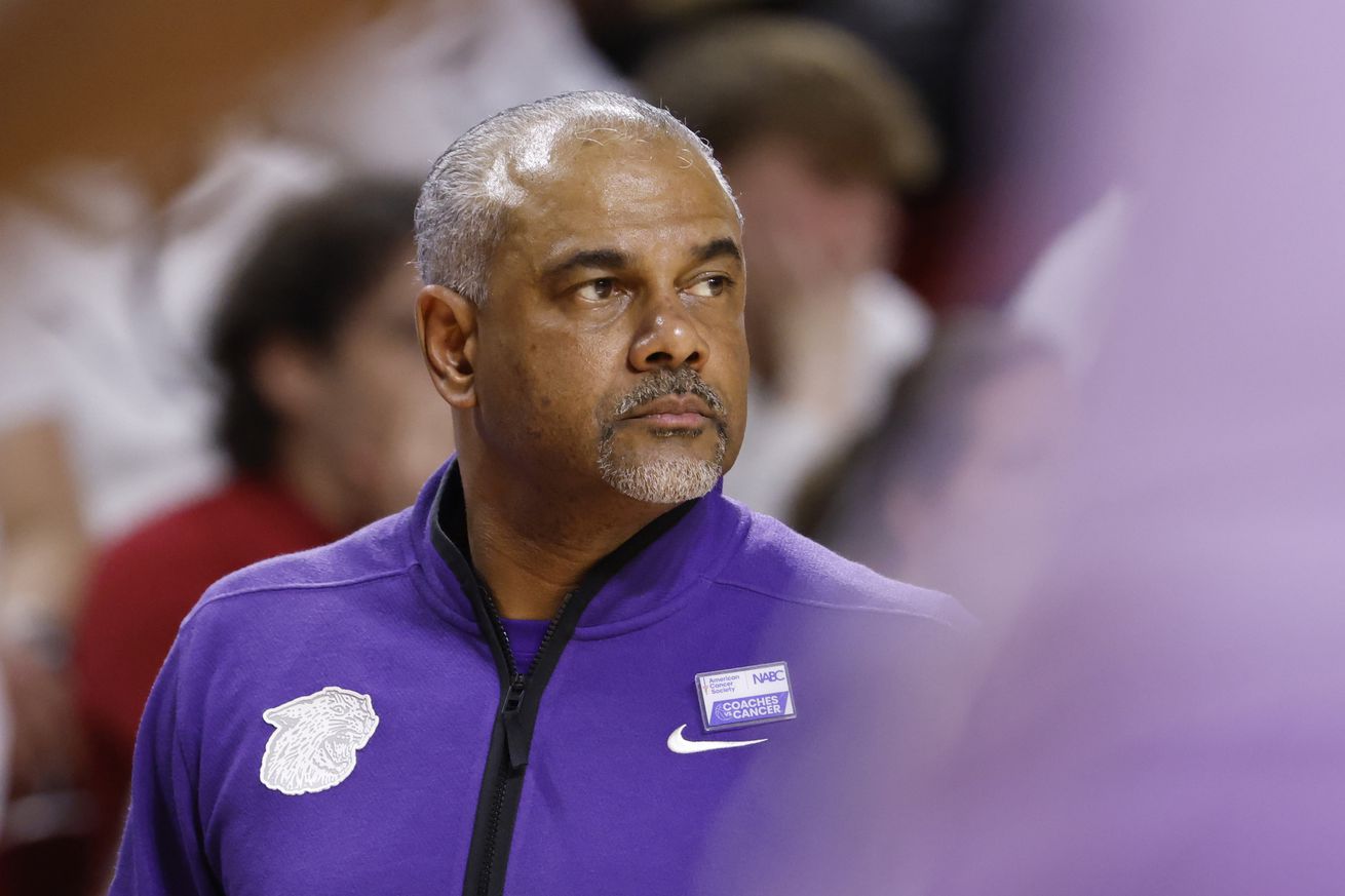 Head coach Jerome Tang of the Kansas State Wildcats coaches from the bench in the second half of play at Hilton Coliseum on February 1, 2025, in Ames, Iowa. The Kansas State Wildcats won 80-61 over the Iowa State Cyclones.