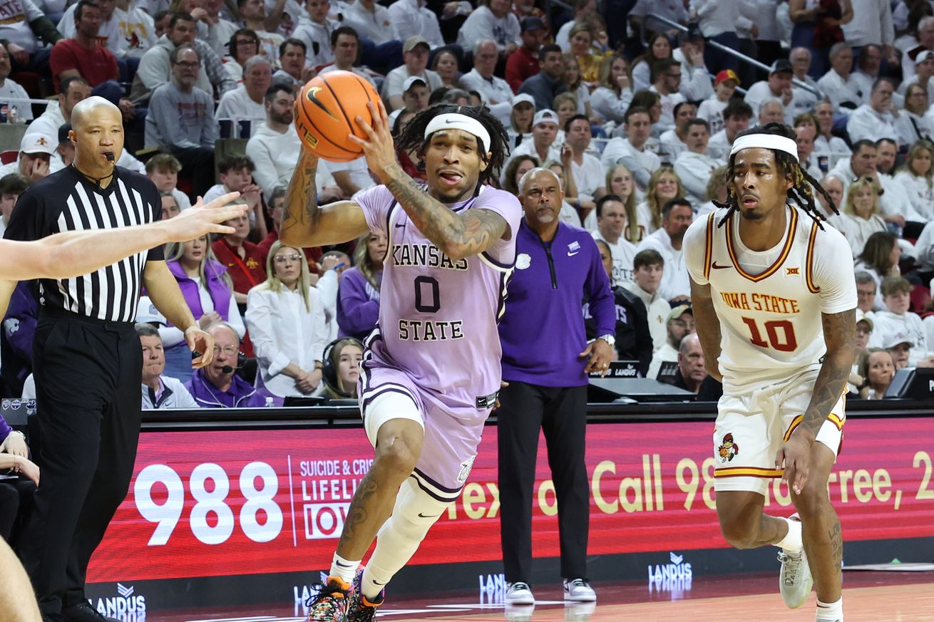 Feb 1, 2025; Ames, Iowa, USA; Kansas State Wildcats guard Dug McDaniel (0) beats Iowa State Cyclones guard Keshon Gilbert (10) to the basket during the second half at James H. Hilton Coliseum. Mandatory Credit: Reese Strickland-Imagn Images