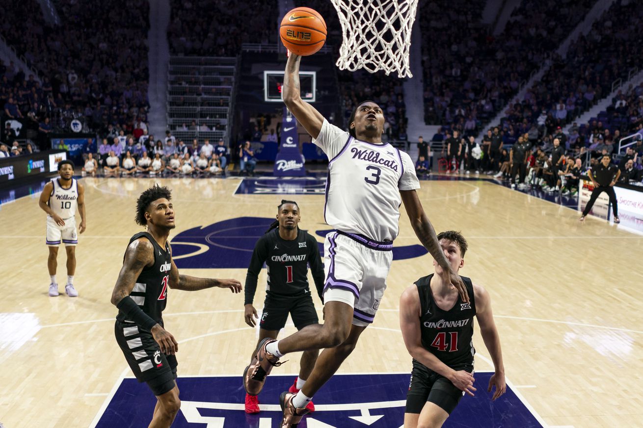 Dec 30, 2024; Manhattan, Kansas, USA; Kansas State Wildcats guard C.J. Jones (3) goes up for a dunk during the second half against the Cincinnati Bearcats at Bramlage Coliseum.